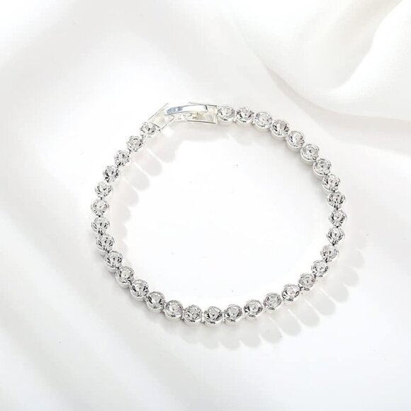 Shiny Cubic Zirconia Tennis Bracelet in Gold Plated Silver for Fashionable Women - Picture 3 of 5